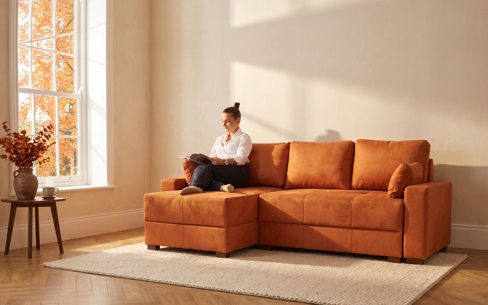 Orange corner sofa bed in an autumn living room